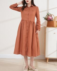 "It was a  linen dress with a fitted cut,  and a vintage look It is ideal for daily wear, party, travel, work, school, indoors and outdoor walks, spending time with family, shopping, etc.The dress is exceptionally comfortable and soft. DETAIL - 100% linen, soft washed - Medium weight linen - Square Neckline - long sleeves - No lining, Don't see through - retro style -Colour: Rusty red Choose CUSTOM Order if you * Need a better fit * Can't find your size in our size Chart * Change the Style * Cha Bohemian Long Sleeve Linen Dress, Chic Long Sleeve Beige Linen Dress, Chic Beige Linen Long Sleeve Dress, Casual Brown Linen Dress For Fall, Beige Linen Long Sleeve Dress For Fall, Beige Long Sleeve Linen Dress For Spring, Casual Long Sleeve Brown Linen Dress, Long Sleeve Brown Midi Summer Dress, Casual Brown Long Sleeve Linen Dress