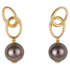 Elsa Peretti has always proven less is more. Rich Tahitian pearls are suspended below elegant geometric loops. 1 1/4 inches in length The pearls are10.6mm each. Earring Inspo, Tahitian Pearl Earrings, Tiffany Diamond, Tiffany Earrings, Louis Comfort Tiffany, Elsa Peretti, Pearl And Diamond Earrings, Simply Chic, Tiffany And Co