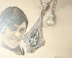 "I am so excited to be offering a beyond stunning antique Art Deco/Edwardian 1920s to 1930s era soft aquamarine blue open back cut crystal and clear paste rhinestone pendant necklace. The perfect \"Something Old\" and \"Something Blue\" for the Bride! Photos don't begin to do this one justice. The stunning just 2 3/8 inches (6 cm) long (including the bale) pot metal ornate pendant features a phenomenal open backed light aqua blue sparkly large pear cut glass crystal. The rest of the setting is l Bride Photos, Vintage Rhinestone Jewelry, Light Aqua, Something Old, Blue Jewelry, Rhinestone Jewelry, Aquamarine Blue, Antique Art Deco, Glass Crystal