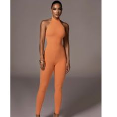 Orange Halter Jumpsuit. Halter Top Has Buttons, No Additional Closures. Material Is Very Stretchy, But Is Not “Snatched” Material. Orange Fitted One-piece Bodysuit, Fitted Orange One-piece Bodysuit, Orange Fitted Jumpsuits And Rompers For Spring, Fitted Sleeveless Orange Bodysuit, Spring Fitted Orange Jumpsuits And Rompers, Spring Orange Fitted Jumpsuits And Rompers, Fitted Orange Jumpsuits And Rompers For Spring, Elegant Fitted Orange Jumpsuits And Rompers, Orange Fitted Elegant Jumpsuit