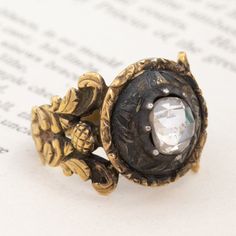 By far one of the most unique antique rings we’ve come across lately! A true antiquity, and covered in delicious patine with a charming Georgian rose cut diamond (with a super high dome!) sitting front and center. We find everything about this piece to be so captivating - from the carved details along the whole ring to the way it feels when worn. 18kt yellow gold Size 8.25 and slightly resizable with limitations Diamond Is K color, SI2 clarity, and GIA standards Please see qualitative report for Modern Mens Rings, Art Jewelry Earrings, Rose Cut Diamond Ring, Rosecut Diamond Ring, Antique Watches, Antique Engagement, Unique Antiques, Mens Band, Vintage Band