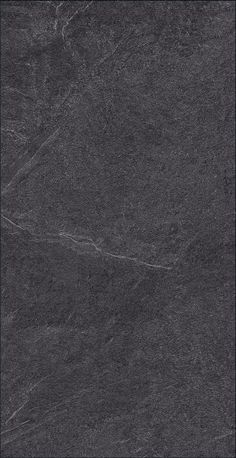 a black marble textured background or wallpaper