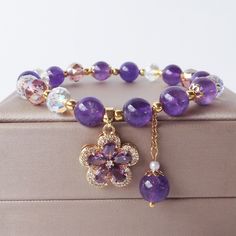 Flower Shaped Stretch Bracelet For Gift, Flower Shaped Stretch Bracelet As Gift, Flower Bracelets For Mother's Day, Flower Shaped Crystal Bracelet For Jewelry Making, Flower-shaped Stretch Bracelet As Gift, Elegant Purple Crystal Bracelet With Gemstone Beads, Elegant Purple Crystal Bracelet With Natural Stones, Purple Flower Shaped Jewelry With Flower Decoration, Elegant Purple Gemstone Bead Crystal Bracelet