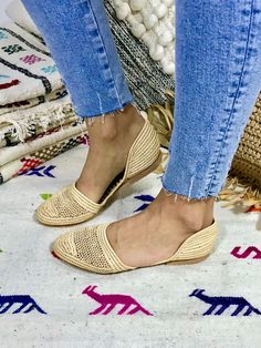 We fell in love with these lightweight shoes and now we want to share this love with you! The slippers are handcrafted in Morocco following old traditions. It takes one day to finish one pair of shoes: That's slow fashion! The upper material is made from palm leaves (raffia) and the sole is a structured rubber. The design is unique and furthermore super comfortable. We don't wanna take them off anymore. This style has additionally a closed heel part to give more stability. Made in Morocco. When Beige Flat Slip-ons With Woven Sole, Beige Slip-ons With Woven Sole, Beige Closed Toe Flats With Textured Footbed, Closed Toe Slippers For Spring, Beige Slip-on Flats With Textured Footbed, Beige Textured Slip-on Flats, Summer Pointed Toe Slippers With Leather Sole, Beige Closed Toe Slip-ons With Rubber Sole, Beige Closed Toe Flats With Woven Sole