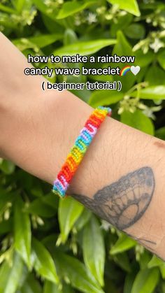 a person wearing a rainbow bracelet on their arm with the words how to make a rainbow candy wave bracelet beginner