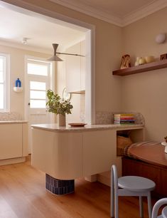 the kitchen is clean and ready to be used as a dining room or living room