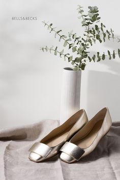 A beautiful metallic flat that adds a chic vibe to your favorite outfit. Made in Italy with extra cushion for comfort, its time to wear it like the queen you are 👑. Bells & Becks is a female founded and owned business created as a lifelong dream come to life. For women over 50 fashion and women under 50 fashion, Bells & Becks offers shoes for women that are confident and know what they deserve. Luxure lifestyle should be attainable, not just aspirational. Here's to minimalist beautiful living. Chic Ballet Flats For Galas, Elegant Low Heel Flats With Metal Feet, Elegant Metallic Closed Toe Flats, Elegant Metallic Flats For Spring, Elegant Gold Pointed Toe Flats For Formal Occasions, Chic Gold Ballet Flats For Evening, Elegant Metallic Flats For Party, Gold Pointed Toe Flats For Party, Metallic Flats For Formal Occasions