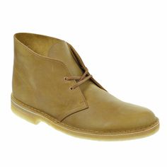 Store Home Shipping Payments Return Policy Customer Service Our Guarantee Clarks Desert Men's Boots Mustard 26108405 Model #: 26108405 Color: Mustard Material: Leather, Synthetic Our Price: 99.95  Size Chart  *Approximate sizing for this item Clarks Mens (US) 7 7.5 8 8.5 9 9.5 10 10.5 11 11.5 12 13 14 15 UK 6.5 7 7.5 8 8.5 9 9.5 10 10.5 11 11.5 12.5 13.5 14.5 EUR 40 41 41 42 43 43 44 45 45 46 47 48 49 50 JAPAN 25 25.5 26 26.5 27 27.5 28 28.5 29 29.5 30 31 32 33 Product Description An international cult classic, the iconic men's Desert Boot by Clarks Originals was inspired by crepe-soled boots worn by British officers in World War II. Crafted from natural materials including mustard leather for supreme comfort, its timeless styling has remained unchanged for over 60 years. Handsewn construc Classic Chukka Boots For Workwear In Winter, Classic Winter Chukka Boots For Workwear, Classic Winter Workwear Chukka Boots, Classic Ankle-high Boots For Fall, Classic Work Boots For Business In Fall, Classic Plain Toe Chukka Boots For Fall, Classic Ankle-high Boots With Rubber Sole, Classic Ankle-high Work Boots For Fall, Classic Brown Chukka Boots With Reinforced Heel