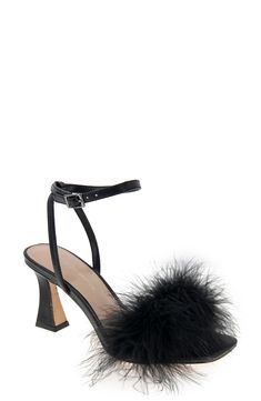 Turn up the volume in your next party look with this strappy sandal flaunting a tuft of fluffy faux feathers and a flared heel. 3" heel Adjustable ankle strap with buckle closure Memory foam-cushioned footbed Textile faux-feather and synthetic upper/synthetic lining and sole Imported Chic Sandals With Feather Trim, Feathered Open Toe Evening Sandals, Feathered Open Toe Sandals For Party, Evening Sandals With Feather Trim And Ankle Strap, Evening Open Toe Sandals With Feathers, Chic Feather Trim Sandals, Formal Open Toe Sandals With Feathers, Party Sandals With Feathers And Open Toe, Chic Sandals With Feathers For Summer