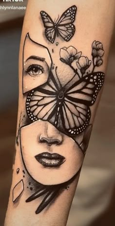 a woman's face with butterflies on it and a butterfly in the shape of a mask