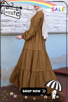 Muslim Solid Color Long Shirt Sundress Casual Pleated Maxi Dress Solid Color Long Sleeve Maxi Dress For Casual Wear, Brown Cotton Long Sleeve Maxi Dress, Modest Long Sleeve Brown Dress, Long Sleeve Brown Maxi Dress For Daywear, Brown Long Sleeve Maxi Dress For Daywear, Brown Long Sleeve Maxi Dress For Casual Occasions, Brown Long Sleeve Solid Maxi Dress, Modest Long Sleeve Cotton Dress, Sundress Casual