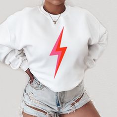 Lightning Bolt Sweatshirt YOUR SIZE NOT AVAILABLE? Send us a message and we will see what we can do! ::INFO:: * 50% cotton 50% polyester * Graphic is high-quality screen printed to be durable and long-lasting! * Wash and dry normally (cool settings or air dry for best results) ::SIZING:: * Sizing is unisex so runs like mens, however not overly large * Most women find their normal size works, since they are meant to fit a bit loose. * SIZE UP FROM YOUR REGULAR SIZE IF YOU ARE GOING FOR A MORE OVE Sweatshirt Preppy, Adrette Outfits, Preppy Sweatshirts, Trendy Crewneck, Summer Sweatshirt, Sweatshirt Trendy, Leopard Print Shirt, College Sweatshirt