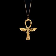 This solid gold key of Ankh necklace showcases exquisite craftsmanship, symbolizing life and spirituality. The key of Ankh pendant is more than just jewelry; it's a fine representation of ancient Egyptian elegance and the timeless allure of this sacred symbol. PENDANT INFORMATIONThis pendant is made of real, solid gold.• Made in USA• Material: 14k or 18k solid gold• Finish: polished• Height: 1.48 (37,5 mm) x Width: 1.17" (30 mm)• Pendant weight: approx. 6 grams (14k)• Bail: fits up to 4 mm chain Key Of Life Necklace, Ankh Jewelry, Elegant Ankh-shaped Gold Jewelry, Egyptian Jewelry Ancient, Symbolic Ankh Brass Necklace, Spiritual Ankh Necklace Hallmarked, Elegant Ankh-shaped Hallmarked Necklace, Cheap Ankh-shaped Spiritual Necklaces, Ankh Necklace