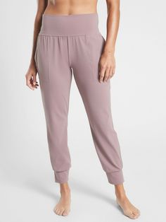 Athleta Salutation Jogger in Powervita #531288 Flora Mauve SIZE M TALL EXCELLENT USED CONDITION (LIKE NEW) $89.00 FIT & SIZING Semi-fitted with a high-rise waistband that holds you in ***Inseam: Regular: 26.5" Petite: 24.5" Tall: 29.5" PRODUCT DETAILS FOR: Layering up to and from yoga or studio workouts FEEL: Powervita™ fabric is buttery soft with support that feels like a gentle hug FAVE: Curved seam on bottom flatters your form #531288 FABRIC + CARE Nylon/Lycra WICKING. Pulls sweat away from t Project Runway, Fitness Studio, Pink Blush, Tag Sale, Jogger Pants, Fabric Care, Blush Pink, Pajama Pants, Active Wear