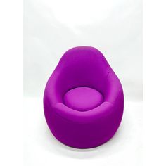 a purple chair sitting on top of a white floor