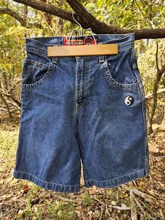 Like New. Vintage 90s Jnco Denim Yin Yang Fire Embroidered Wide Legged Extra Deep Pocket Jean Shorts. Youth 14 90s Style Straight Leg Cotton Shorts, 90s Style Relaxed Fit Medium Wash Bottoms, 90s Style Cotton Straight Leg Shorts, 90s Style Short Length Cotton Jeans, 90s Relaxed Fit Medium Wash Bottoms, 90s Style Denim Blue Cotton Bottoms, 90s Style Short Jeans With Pockets, 90s Style Short Jeans, 90s Style Fitted Jean Shorts With Pockets