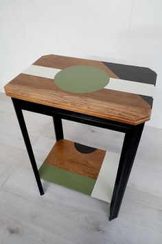 a wooden table with an abstract design on it