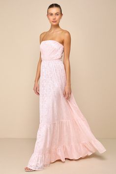 You'll be a vision of perfection in a look like the Lulus Adorably Elegant Blush Pink Jacquard Floral Strapless Maxi Dress! Lightweight woven fabric, with a shiny, burnout floral jacquard pattern throughout, shapes a strapless bodice with a diagonally pleated texture, hidden no-slip strips, and side boning. Fitted waist tops a flaring skirt that falls to a tiered maxi hem. Hidden zipper/clasp at back. Fit: This garment fits true to size. Length: Floor length. Size medium measures 54" from top to