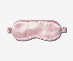 Luxurious soft pink 100% Pure Silk Eye Mask. Made from 100% pure silk with a soft, inner padding. This eye mask is gentle on your skin so that you wake up feeling refreshed and rejuvenated every morning. Silk prevents damage, wrinkles and creasing across your face by allowing the skin to glide gently across the surface rather than pulling or tugging against the fibres.Naturally hydrating, silk helps delicate facial skin retain its moisture, reducing the appearance of fine lines around the eyes.Enjoy a good nights sleep with this pure silk eye mask. Pink Eye Mask, Mask Spa, Slip Pillowcase, Best Sleep Mask, Spa Relaxation, Eye Mask Sleep, Indie Lee, Silk Sleep Mask, Sleep Masks