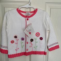 Perfect For Easter And Other Spring Celebrations, Hanna Andersson Lightweight Organic Cotton Sweater With Embroidered Flower Details. Size 80 (Us Size 2). Never Worn, From A Smoke Free Home. Hanna Andersson, Spring Celebration, Cotton Cardigan, Cotton Sweater, Embroidered Flowers, Colorful Sweaters, Kids Shirts, Pink White, Sweater Top