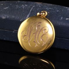 Beautiful Antique Victorian 10K Yellow Gold Engraved Locket Pendant. This classic locket is crafted in 14k yellow gold. The locket is plain and has an engraving of the previous owners initials on one side. A very beautiful and classic locket. Item #N0089 Metal: 10K Yellow Gold Weight: 7.8 Grams Size: 1 inch in diameter Measurements: The pendant is 1 inch in diameter and 5.52 mm deep. Layaway: For your convenience, we will be happy to provide layaway payment options. Please contact us to work out Heirloom Yellow Gold Locket Necklace For Anniversary, Elegant Hallmarked Locket Necklace For Formal Occasions, Victorian Yellow Gold Locket Necklace For Formal Occasions, Heirloom Hallmarked Locket Necklace For Anniversary, Formal Heirloom Locket Necklace Stamped 14k, Elegant Engraved Rose Gold Locket Necklace, Formal White Gold Engraved Locket Necklace, Luxury Engraved Locket Necklace For Keepsake, Victorian Engraved Yellow Gold Locket Necklace