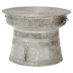 an old silver metal stool on a white background