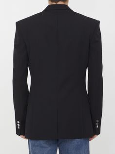 Fitted jacket in black wool. It features shoulder pads, single-breasted closure with a single silver-tone embossed button, classic lapels, two side flap pockets, a welt pocket on chest and silver-tone embossed buttoned cuffs. The model is 188cm tall and wears size IT 50.  Size nationality: IT  Product number: 5500457  Product code: BH1SE035WC090PA  Composition: 100% virgin wool Fitted Jacket, Platform Wedge Heels, Workout Jacket, Dress With Cardigan, Couture Collection, Clothes Collection, Cardigan Jacket, Wool Jacket, Black Wool