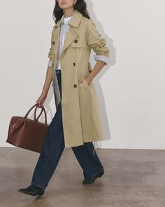 The Modern Trench Coat Cornstalk – Everlane Chic Tailored Outerwear With Belted Cuffs, Classic Outerwear With Notch Lapel And Belted Cuffs, Chic Double-breasted Outerwear With Belted Cuffs, Notch Lapel Belted Outerwear For Work, Belted Notch Lapel Outerwear For Work, Office Long Coat With Belted Cuffs, Spring Business Outerwear With Belted Cuffs, Belted Long Coat For Work, Classic Collared Outerwear With Belted Cuffs