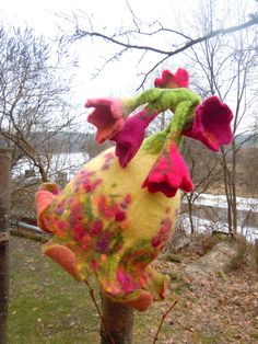 Beautiful bell shaped hat with pink and purple flowers. Unique hat in which you will feel amazingly good. It is from natural material and created with love. Warmth, coziness, pleasure and festive feeling will embrace you. Good mood is guaranteed. A good gift for a good person. This hat is made of 100% wool using wet felting technique. Its made by my hands in my small home studio. Materials: New Zealand sheep wool 100% Hats can be ordered in any colors and sizes. If you want the hat just like in Whimsical Flower-shaped Mini Hats For Garden Party, Whimsical Flower Mini Hat For Garden Party, Whimsical Pink Flower Hat, Whimsical Hats With Handmade Flowers For Garden Party, Whimsical Pink Hat For Carnival, Whimsical Flower-shaped Hats For Garden Party, Whimsical Mini Cap For Festival, Whimsical Mini Cap For Festivals, Whimsical Festival Mini Cap