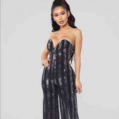 Gorgeous Black/Silver Sequin Jumpsuit. Strapless Neckline With Built In Support. Metallic Sleeveless Jumpsuit For Night Out, Metallic Sleeveless Jumpsuits And Rompers For Party, Metallic Sequined Jumpsuits And Rompers For Night Out, Glamorous Metallic Jumpsuits And Rompers With Sequins, Glamorous Strapless Jumpsuits And Rompers For Party, Glamorous Strapless Jumpsuits And Rompers For Date Night, Glamorous Metallic Jumpsuit With Sequins, Glamorous Strapless Sequin Jumpsuit For Night Out, Glamorous Strapless Party Jumpsuits And Rompers