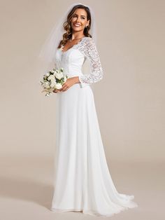 a woman in a white wedding dress holding a bouquet