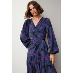 Purple floral crepe (100% Polyester). A-line. Long sleeves. V-neck. Tie closure. 58" from shoulder to hemline. Imported. Chic Floral Print Midi Dress With Surplice Neckline, Chic Midi Dress With Floral Print And Surplice Neckline, Chic Midi Dress With Surplice Neckline And Floral Print, Chic Floral Midi Dress With Surplice Neckline, Floral Print Surplice Neckline Maxi Dress For Evening, Floral Print Midi Wrap Dress For Work, Chic Floral Dress With Surplice Neckline, Chic Floral V-neck Dress For Formal Occasions, Elegant Floral Dress With Surplice Neckline For Brunch