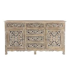 an old wooden sideboard with intricate carvings on the front and sides, against a white background