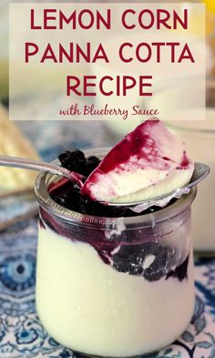 lemon corn panna cota recipe in a jar with blueberry sauce on top