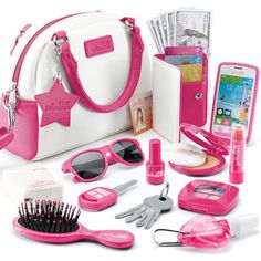 a pink and white purse with various items in it, including hairbrushes, sunglasses, cell phone, keys, etc