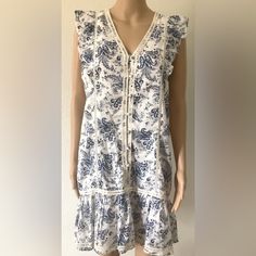 Nwt Lucky Brand Floral Dress Sz Small Regular Women’s, V-Neck, Lined, 55% Cotton 45% Viscose, Lining 100% Cotton Knitted Accents, Ruffle Sleeve, Blue/ Cream Color, Front Buttons, Knee Length, Made In India Shoulder To Shoulder 12.5” Deep Neck 9.5” Arm Hole 9.5” Armpit To Armpit 19.5” Waist One Way Flat 19.5” Hips One Way Flat 21” Length From Armpit 24” Length From Shoulder 34.5” Casual V-neck Dress With Lace Trim, V-neck Rayon Dress With Boho Print, Floral Print Rayon Sundress With V-neck, Lucky Brand Embroidered Dress, Boho Print Rayon V-neck Dress, Gathered Maxi Dress, Boho Sundress, Long Sleeve Boho Dress, Blue Linen Dress