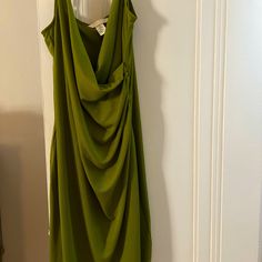 Green Cocktail Dress. Never Worn! Spring Green Draped Dress, Green Draped Spring Dress, Spring Draped Midi Dress, Chic Green Draped Mini Dress, Green Draped Mini Dress For Date Night, Spring Cocktail Midi Dress With Draped Design, Casual Draped Midi Dress For Spring, Casual Fitted Draped Midi Dress, Green Draped Mini Dress For Spring