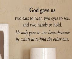 a wall decal saying god gave us two ears to hear, two eyes to see, and two hands to hold