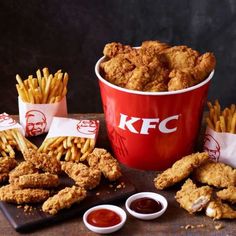 chicken nuggets and french fries on a table