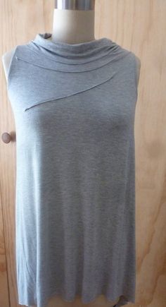 Light gray sleeveless top with front stitch detail and drape back detail Drape Top, Velvet Scarf, Drape Sleeves, Draped Top, Gray Top, Grey Top, Nice Tops, Womens Clothing Tops, Light Gray