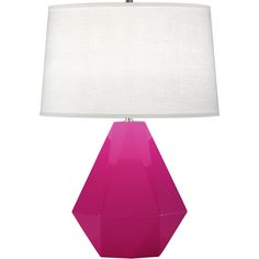 a pink table lamp with a white shade