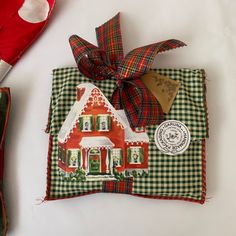 a christmas decoration with a gingerbread house on it