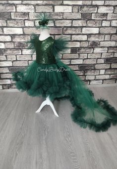 All dresses are made as mother and daughter Please ask for color option. The dress is made in 1 or 2 day. This Emerald Green Dress is completely made of health-safe and kid-friendly materials. Inner parts are 100% cotton and outer parts are sewed with high quality sequin and tulle. Dress is made to order in any size. If you want it to fit perfectly, please, send me the measurements of your daughter and I will sew the dress according to the measurements. Please follow the page. Take care of yours Green Princess Tutu Dress For First Birthday, Green Ruffled Dress For First Birthday, Green Princess Tutu Dress For Party, Green Princess Style Party Tutu Dress, Fitted Green Princess Dress For Birthday, Green Fitted Princess Dress For Birthday, Green Tulle Birthday Dress, Green Fitted Dress For First Birthday, Green Tulle Dress For Birthday