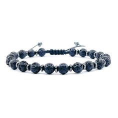 This elegant men's bracelet is made with Black Lava stones measuring 6mm, separated from each other by tiny 5mm Rondelle stone hematite separators, and strung on a black waxed thread made of 100% polyester.  It measures 6.5 inches or 16.5 cm. The closure is adjustable and can thus accommodate thicker wrists. If you believe it needs to be significantly larger or smaller, please let me know the wrist size and I will be happy to customize it for your order.  The standard size is ready to ship in 1-2 days. Custom pieces can take 3-4 business days to be shipped.  This is a special present for a special person. Because Lava stones are made from molten lava that has solidified under intense heat and pressure, they are known for symbolizing strength and courage. Paired with the Hematite stones, wh Black Lava Stone Beaded Bracelets, Hand-strung, Hand-strung Black Lava Stone Beaded Bracelets, Black Hand-strung Lava Stone Beaded Bracelets, Adjustable Black Wristband With 8mm Beads, Adjustable Black Bracelets With 8mm Beads, Adjustable Black Wristband With Gemstone Beads, Spiritual Black Braided Bracelet With Round Beads, Adjustable Black Wristband With Natural Stones, Adjustable Silver Lava Stone Bracelets