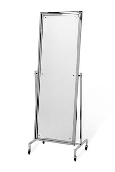 a large mirror sitting on top of a metal stand next to a white wall with wheels