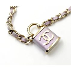 This is part of Chairish’s Costume Jewelry assortment.  Chanel Light Gold CC Lavender Lock Pendant Necklace   *Marked 18 *Made in Italy *Comes with the original box and pouch  -The  length is about 17". -The pendant is approximately 1.5" x 1" -In an excellent condition. There is a light scratch next to the cc. Chanel Pendant Necklace, Long Chanel Necklace, Silver Chanel Necklace, Chanel Lock Necklace, Chanel Pendant, There Is A Light, Lock Pendant, Vintage Cartier Bracelet, Luxury Vintage