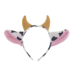 a cow print headband with horns is shown in the shape of an animal's ears