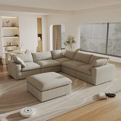 a living room with a sectional couch and ottoman