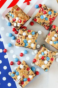 red, white and blue treats are arranged on a plate