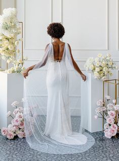 Beautiful and soft bridal cape with elegant pearls. Made of luxurious bridal tulle fabric to create an effortless drape. Attached at the shoulders with either small white ribbons (for dresses with spaghetti straps) or small 1 inch clasps (for dresses with thicker straps). Pearl A fabric has 1 size of pearl, and few pearls scattered throughout. Pearl B fabric has 2 sizes of pearls and more pearls scattered throughout. Pearl B fabric will be a little bit heaver than fabric A due to the bigger pear Wedding Cape, Bridal Gloves, Bridal Cape, Big Pearl, Bow Hair Accessories, Pearl Bridal, Net Fabric, Ivory Dresses, Tulle Fabric